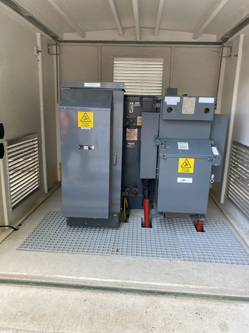 Packaged substation interior with Schneider Electric and Lucy Electric switchgear and transformer installed by Aquamain